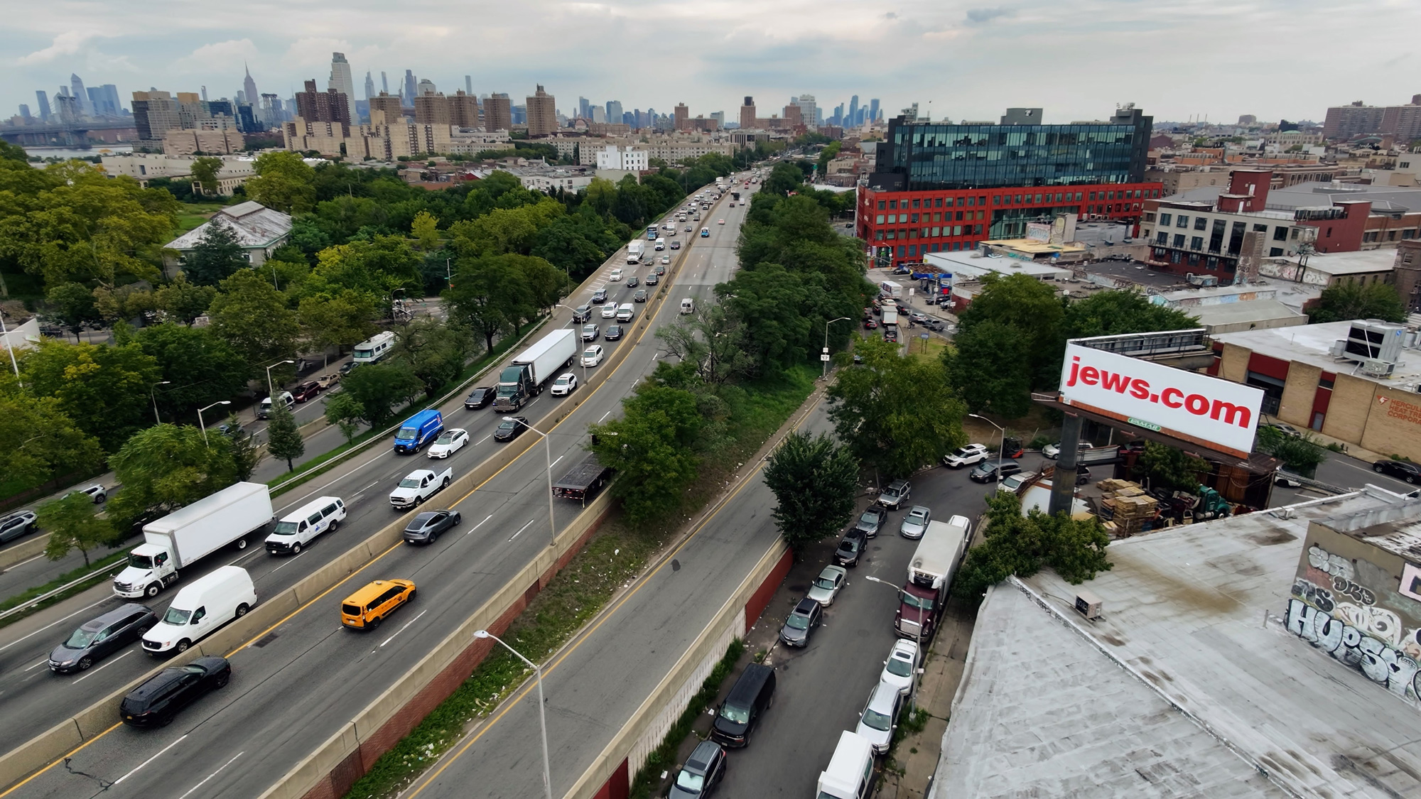 Actual Jews.com billboard above a New York street